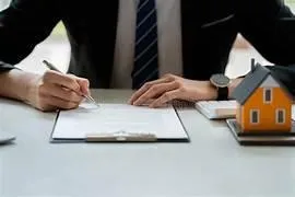 Person using phone and laptop