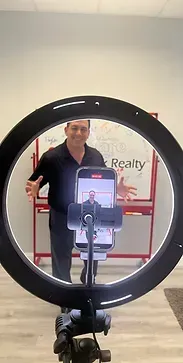 Agent recording video with ring light